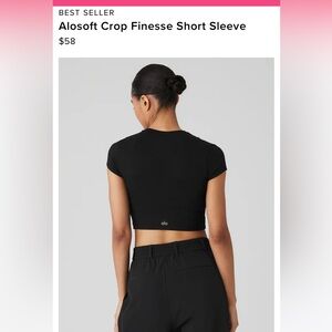ALO YOGA lightly worn black cropped tee in size small